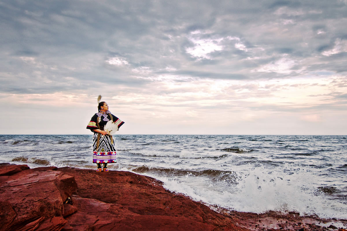 Mi'kmaq woman standing on Prince Edward Island shore